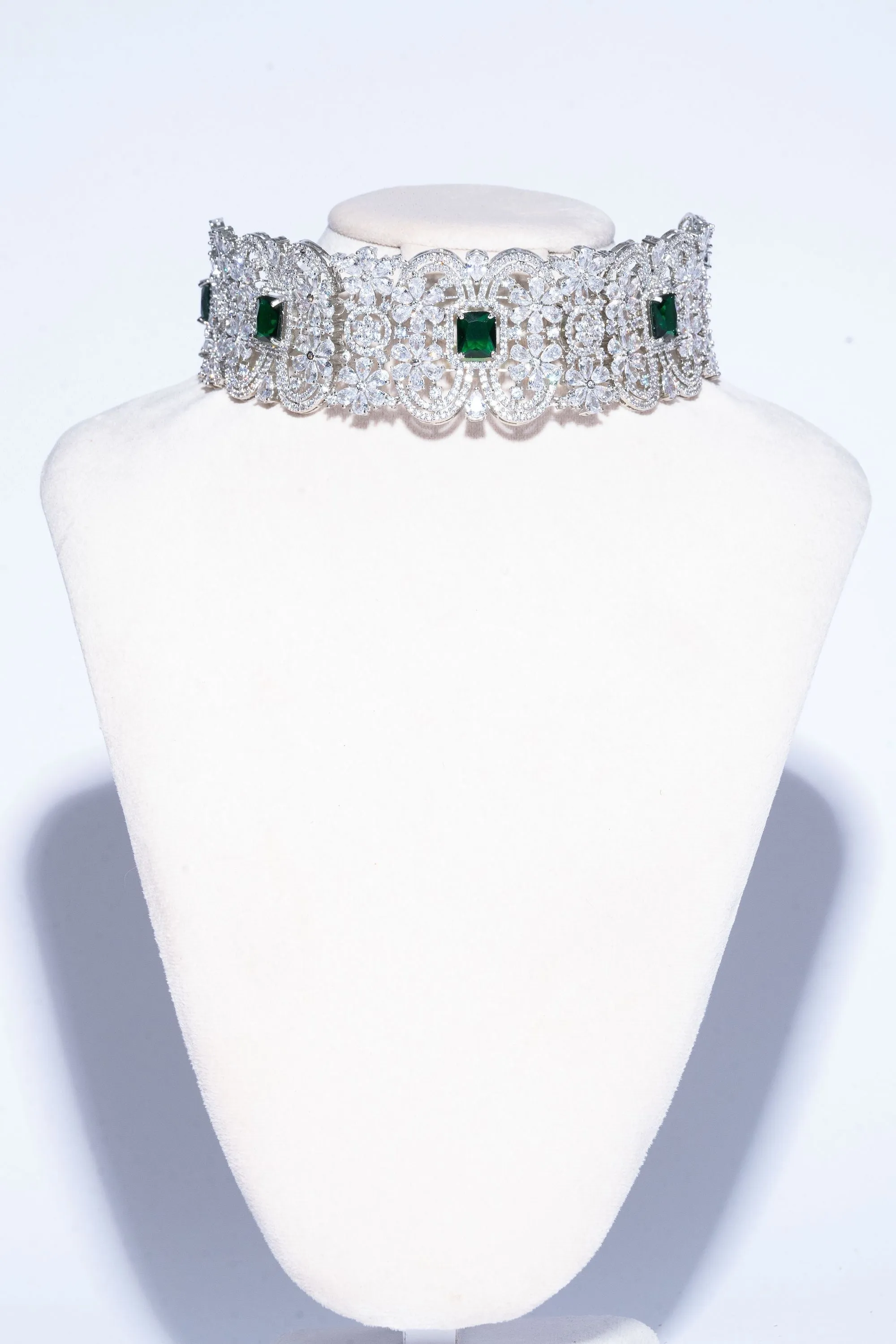 Cerise White Gold and Emerald Choker and Jhumka Earring Set By Jaipur Rose Designer Modern Indian Jewelry