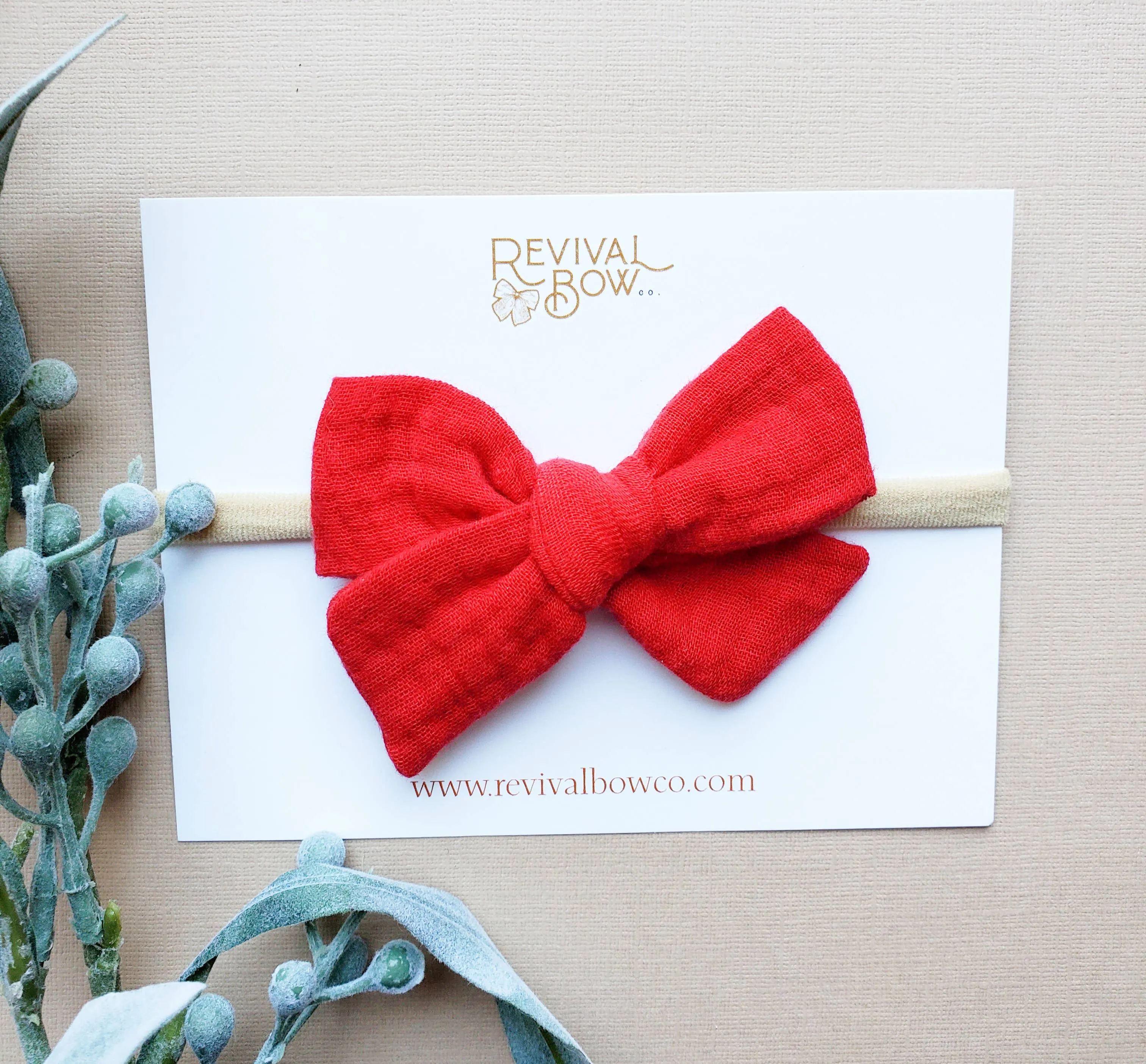 Christmas Bow on Headband in Holly Berry Gauze