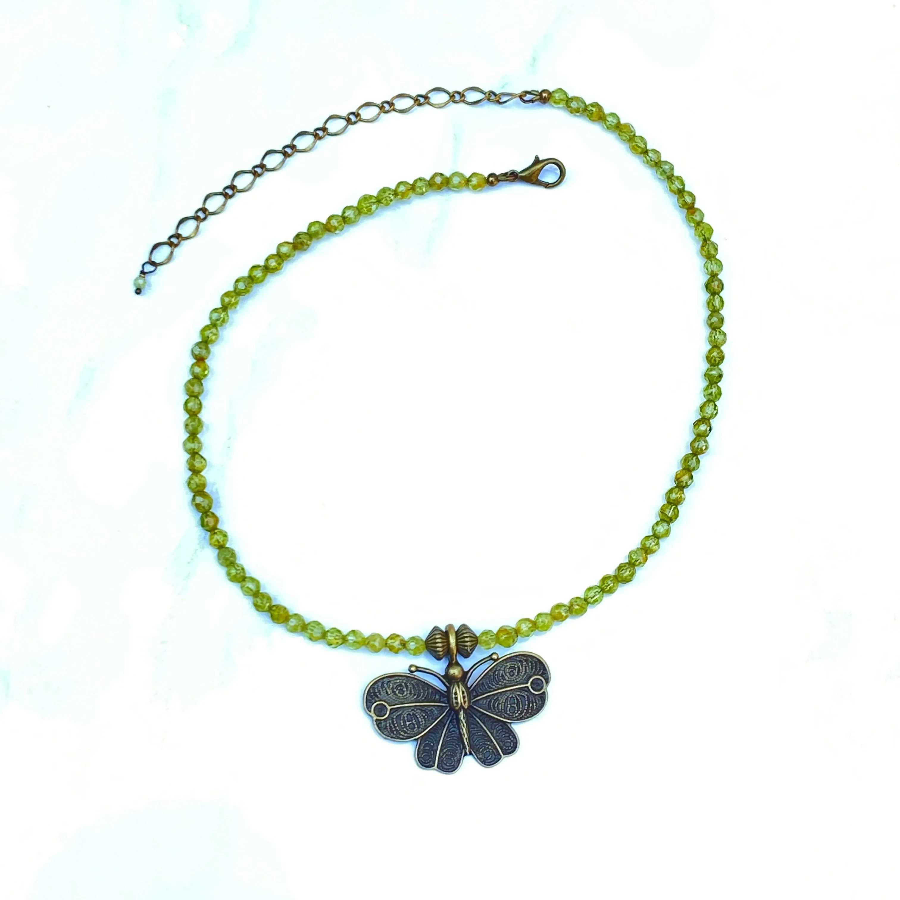 Peridot gemstone and Brass Butterfly Necklace