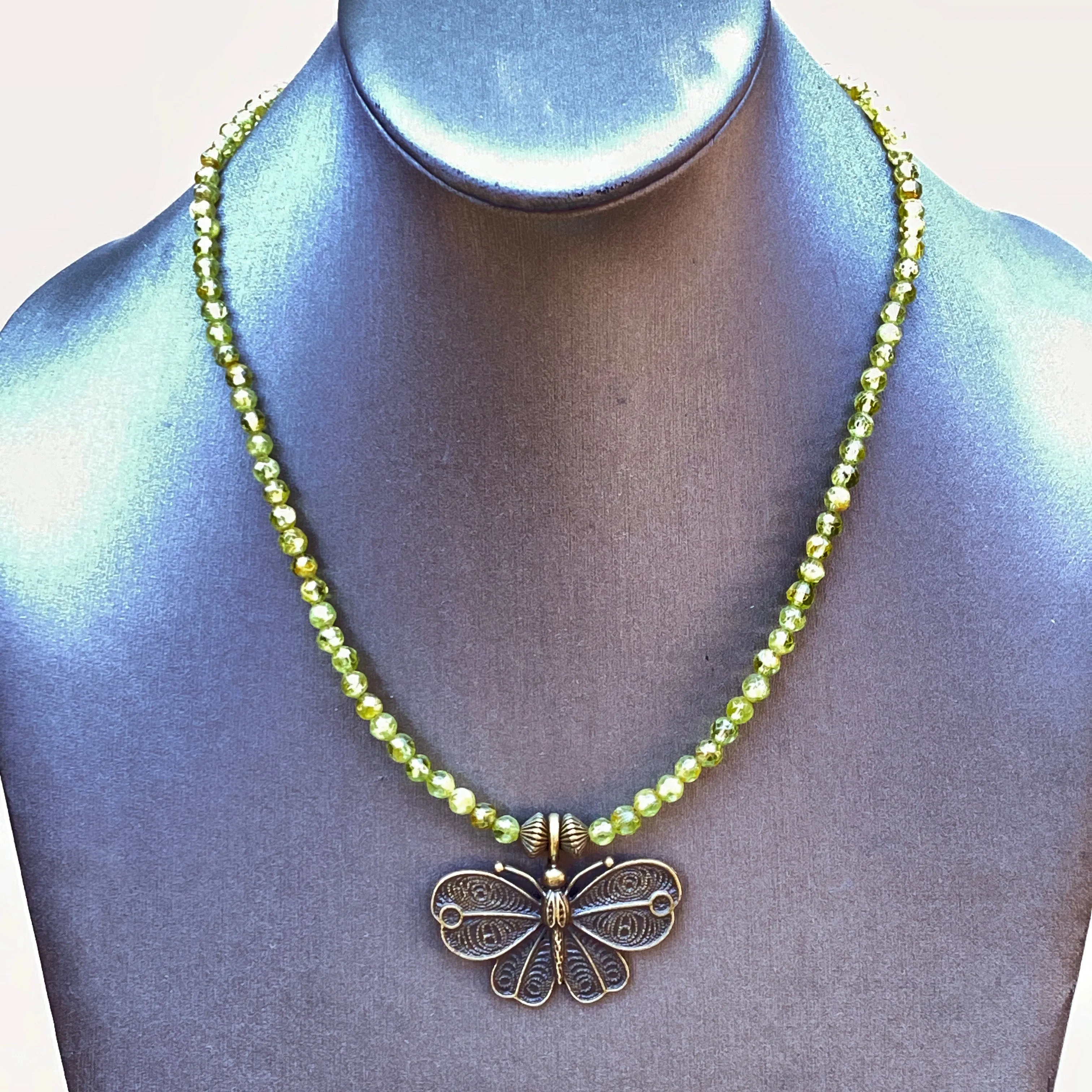 Peridot gemstone and Brass Butterfly Necklace