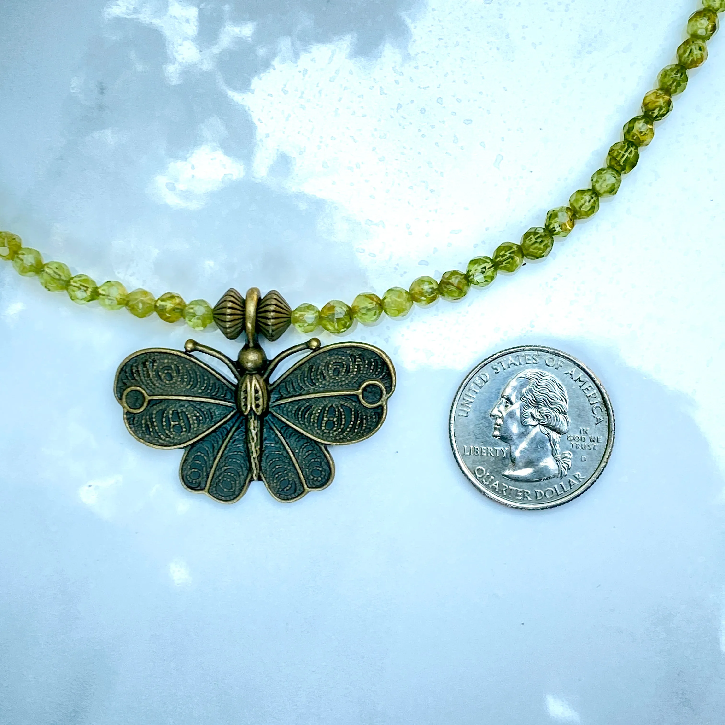 Peridot gemstone and Brass Butterfly Necklace