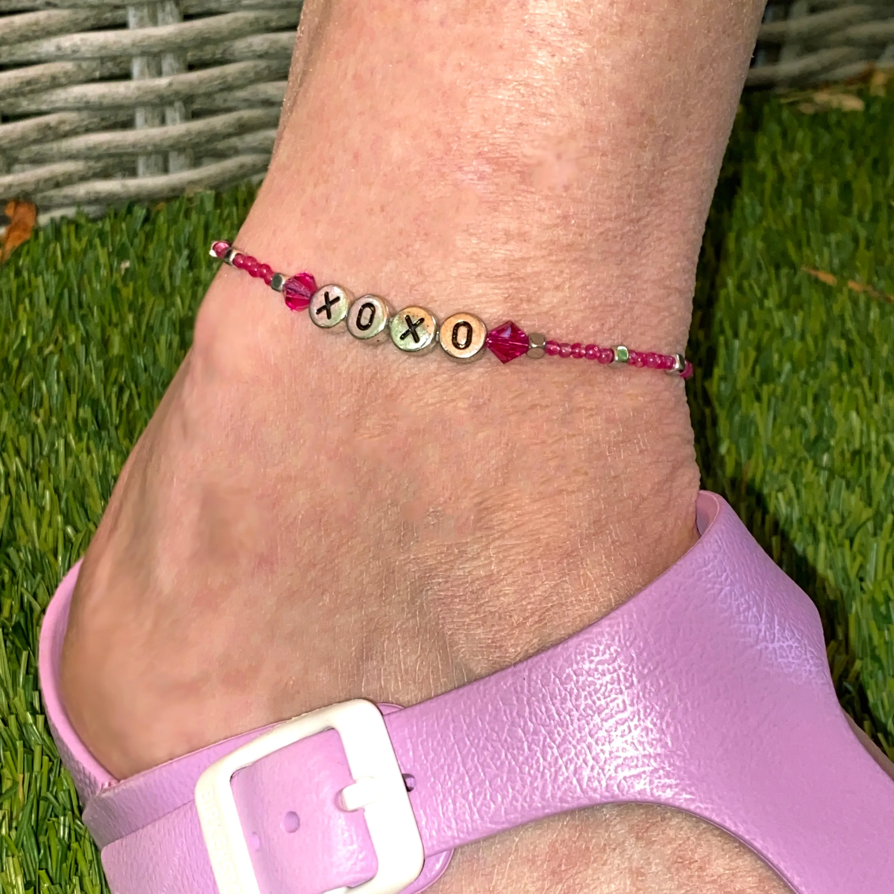 Pink agate, hematite, and Swarovski Crystal “xoxo” sterling silver anklet