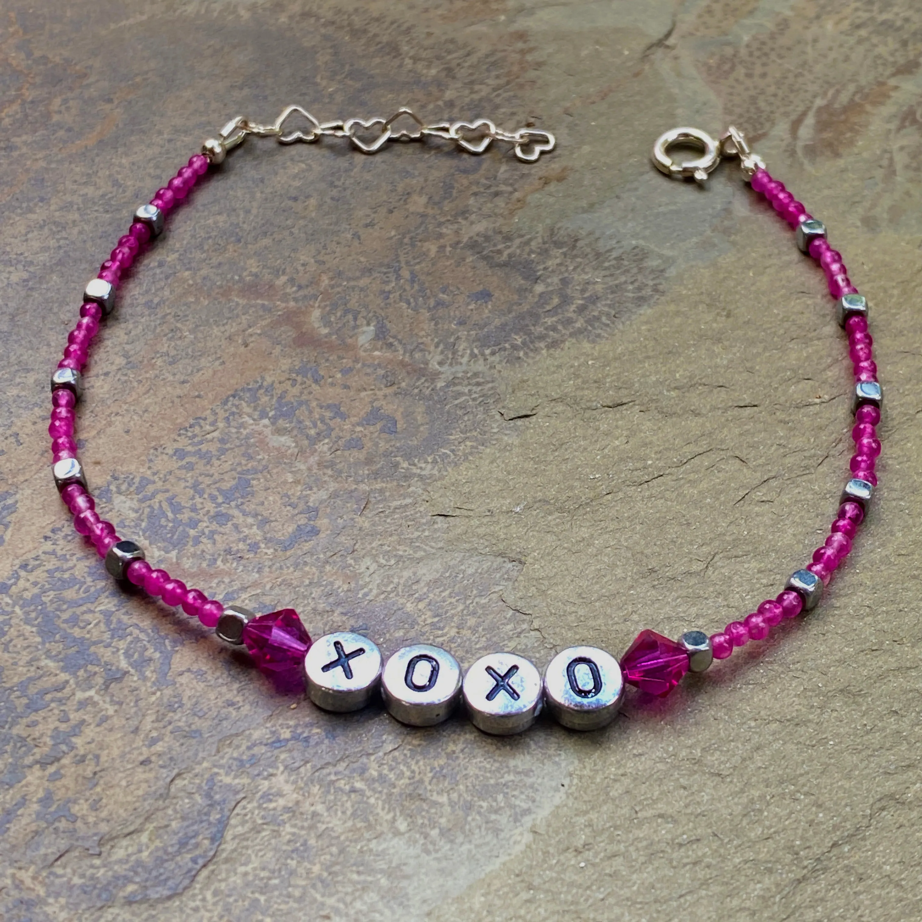 Pink agate, hematite, and Swarovski Crystal “xoxo” sterling silver anklet